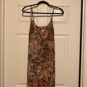Free people midi dress. Size medium. Worn once to a wedding. Adjustable straps